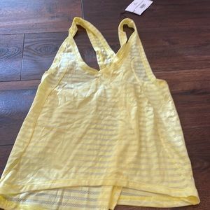 Zyia yellow nimbus tank size small